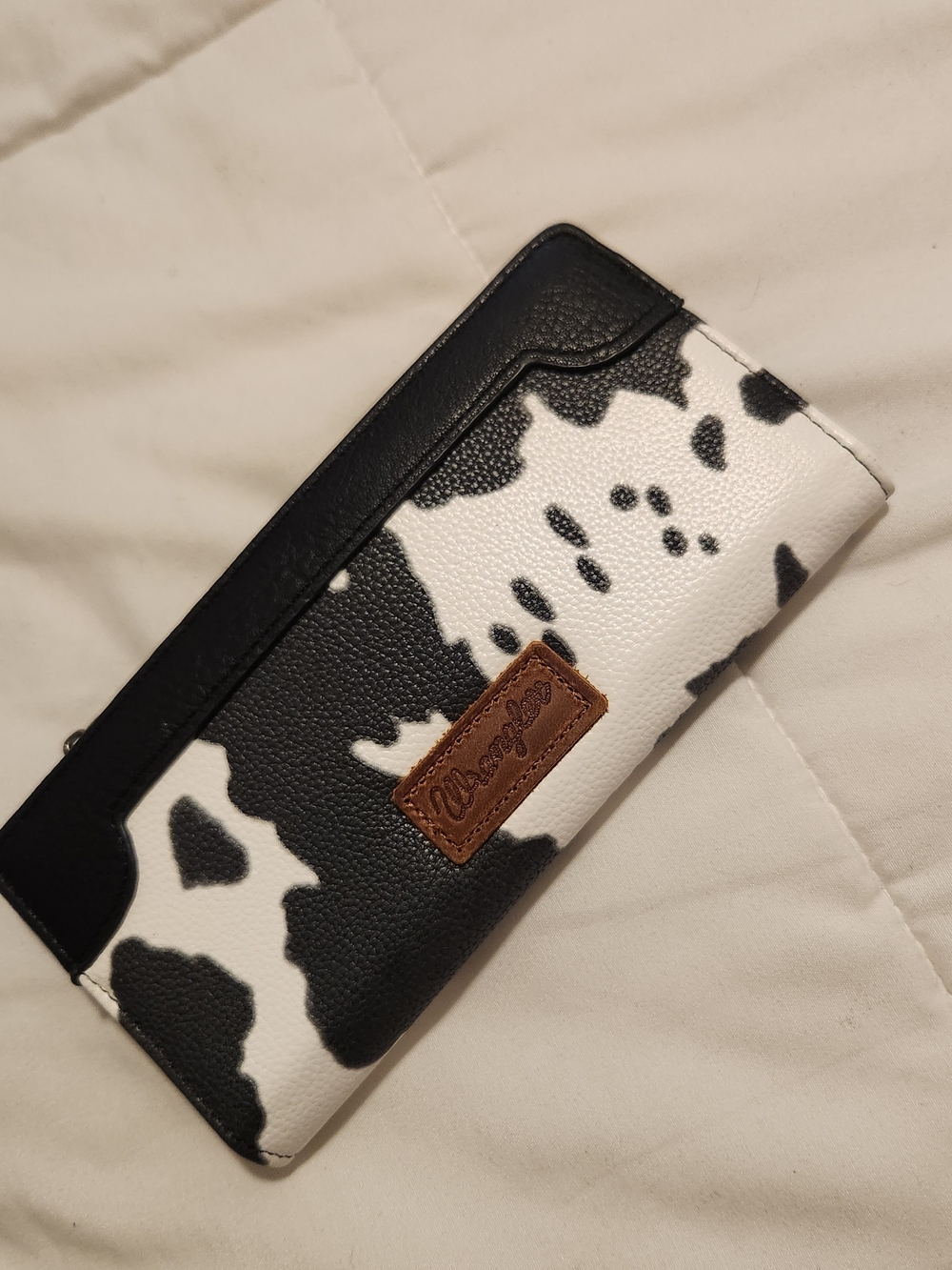 Wrangler Black and White Cow-Print Zip Wallet with Brown Patch